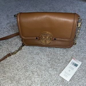 New with tag Tory Burch small purse/clutch with removable strap.